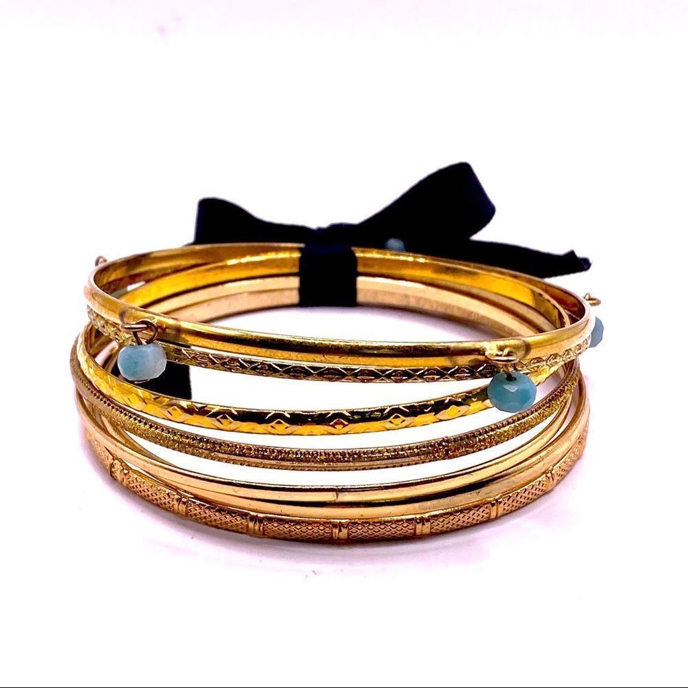 𝅺7 Antique Gold Bangles 
7.75 inches round